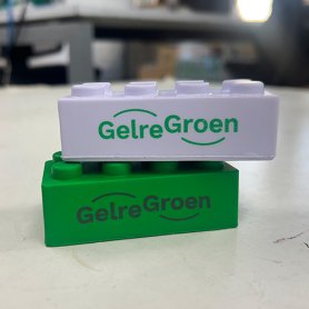 Wit en groene bouwsteen